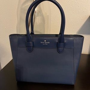 Blue Kate Spade Purse with extended strap. Like new, barely used.